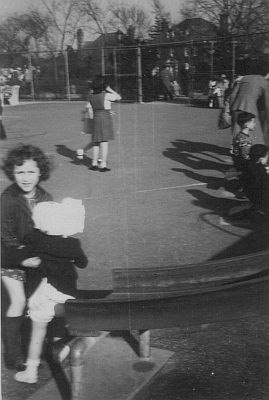 I have this picture of the playground in the park. The houses in the background are on Park Lane South in Kew Gardens, NY.