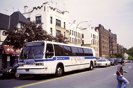 A bus on Metropolitan Avenue at Lefferts Boulevard in Kew Gardens, NY in June of 2004.
