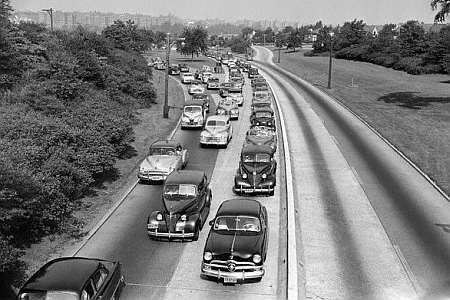 The Grand Central Parkway looking west to the Queens Boulevard exit and Kew Gardens, NY, 1951.  Notice the absence of traffic in the westbound lanes.